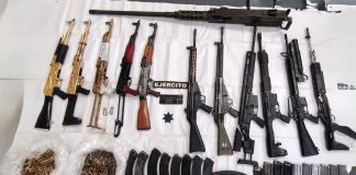 Fuerzas estatales y federales aseguran ametralladora y 11 fusiles en Huetamo: SSP